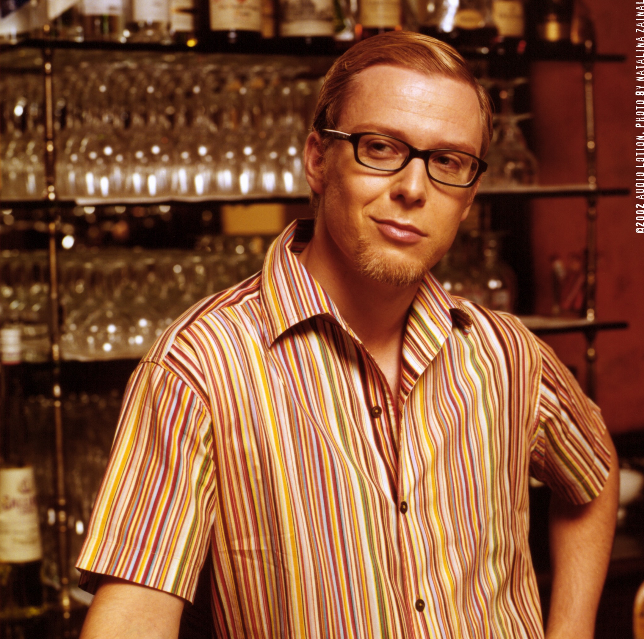 Portrait of a musician in a striped shirt